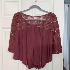 red blouse with open pattern